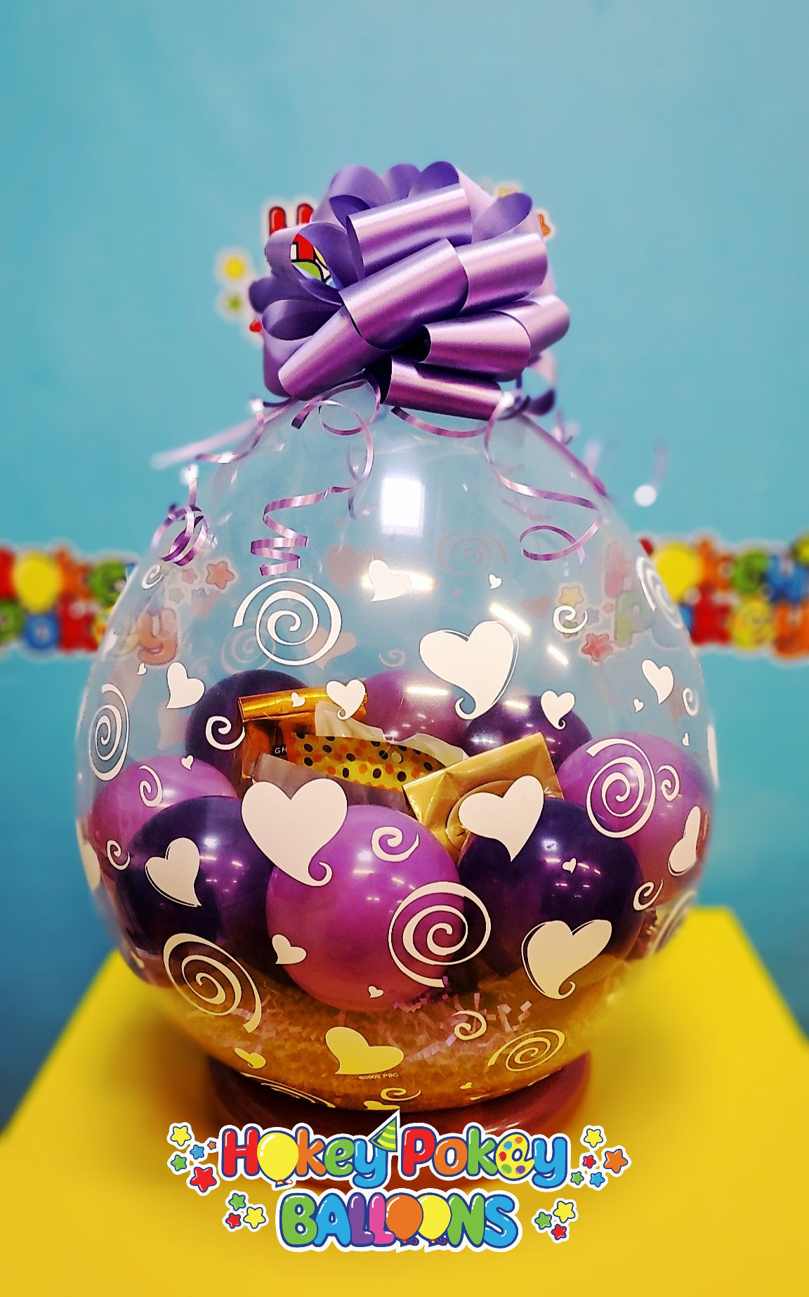 Picture of Chocolate Paradise - Stuffed Balloon Gift with Bow